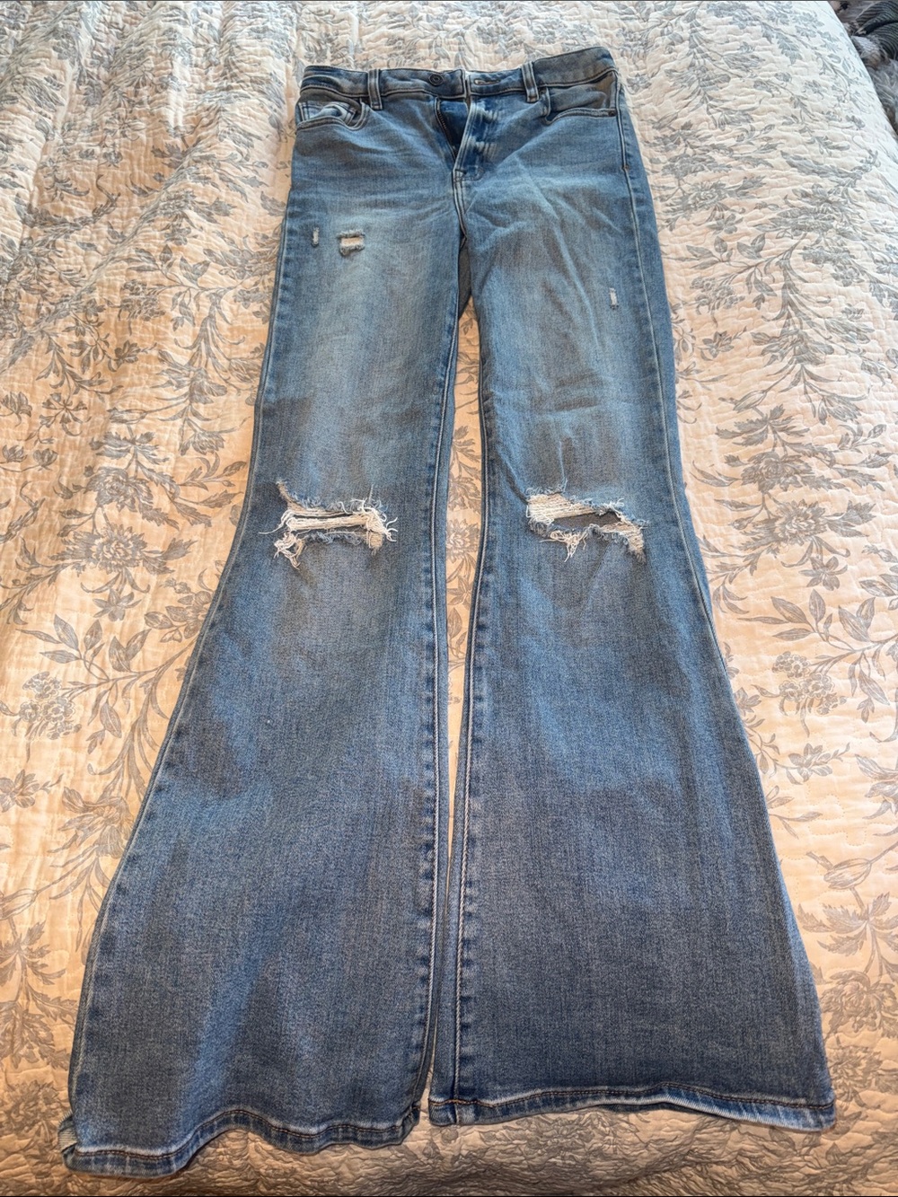 Distressed Light Blue Wide-Leg Flare Jeans